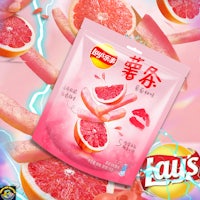 a bag of grapefruit chips on a pink background