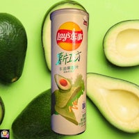 a can of lynch's avocado chips on a green background